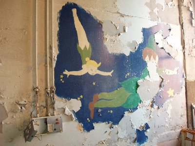 Despite the decay these murals still give a jolly feel to the peadiatric wards... this is Peter Pan and Tinkerbell if my memory serves me correctly?